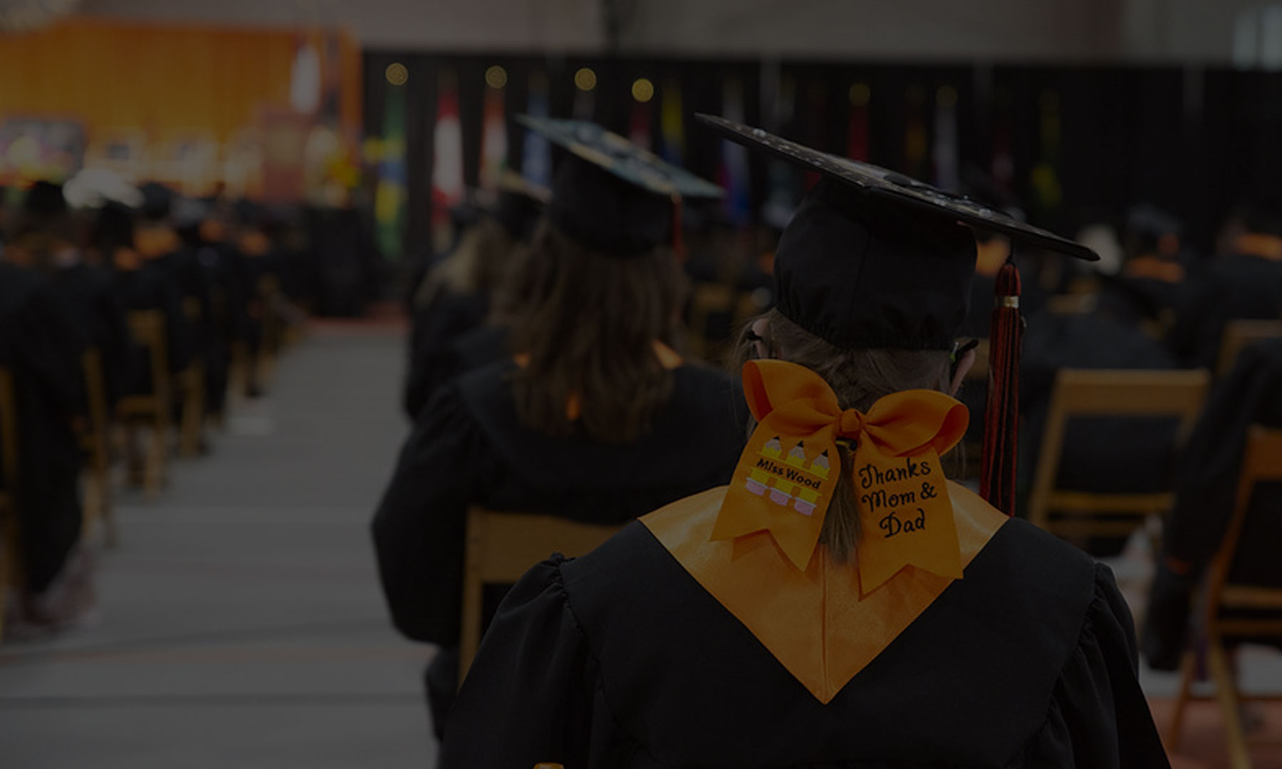 student with graduation cap at graduation
