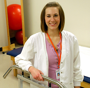 Physical therapy student completes clinicals to earn doctorate.